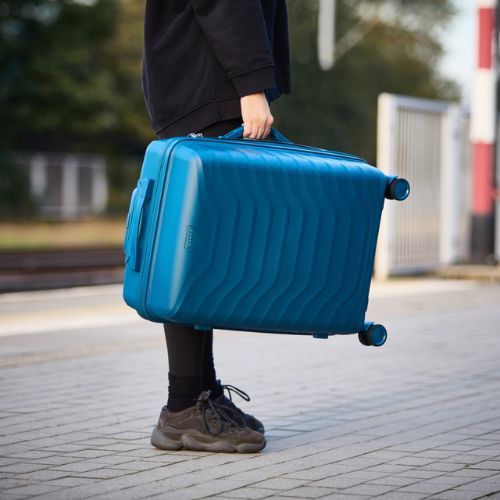Közepes méretű utazóbőrönd KADVA Sancho 72 l kék