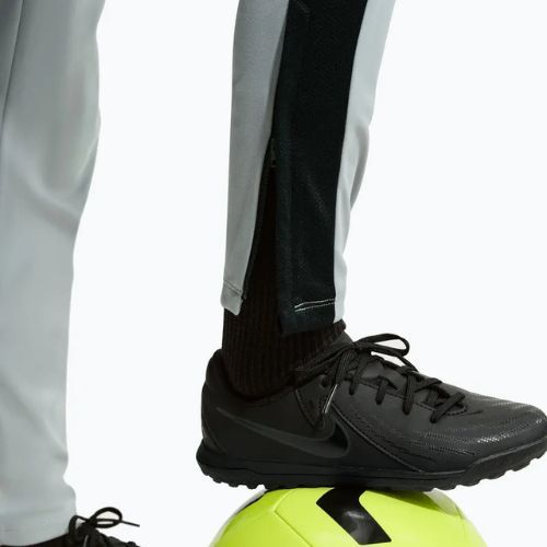 Gyerek nadrág Nike Academy Dri-Fit Jr light smoke grey/white/black/metallic gold