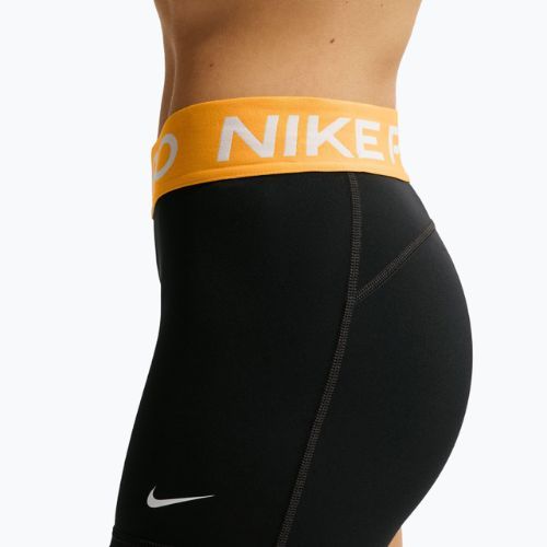 Női rövidnadrág Nike Pro Mid-Rise Biker 3" black/university gold/white