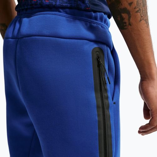Férfi futballnadrág Nike FFF Tech Fleece Joggers game royal/metallic copper