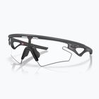 Napszemüveg Oakley Sphaera Slash carbon/clear to black iridium photochromic