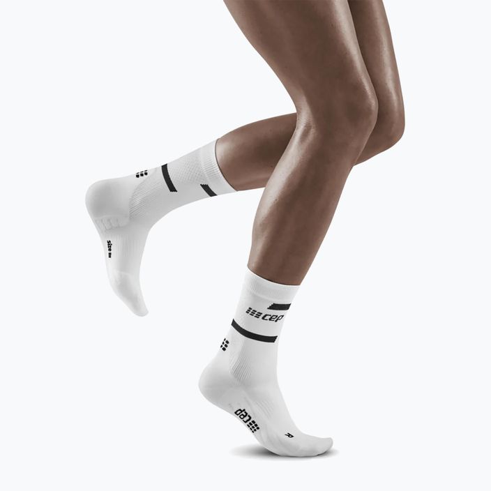 CEP női kompressziós futó zokni 4.0 Mid Cut fehér 5