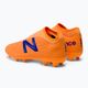 Gyermek futballcipő New Balance Tekela V3+ Magique FG narancssárga JST3FD35.M.045 3