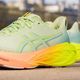 ASICS Novablast 4 Paris női futócipő cool matcha/safety yellow 10