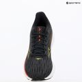 Női futócipő Mizuno Wave Rider 28 fekete/estvélyi primrose/mákpiros 9