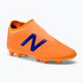 Gyermek futballcipő New Balance Tekela V3+ Magique FG narancssárga JST3FD35.M.045