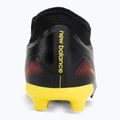 Gyerek focicipő New Balance Tekela Team V5 black 100/punch yellow/fire cracker 6