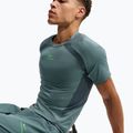 Férfi edzőpóló Nike Pro Training Dri-Fit mineral slate/faded spruce/green strike 4
