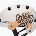 Gyerek sisak UVEX Kid 4 Style super hero warm grey matt 7