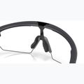Napszemüveg Oakley Sphaera carbon/clear to black iridium photochromic 7