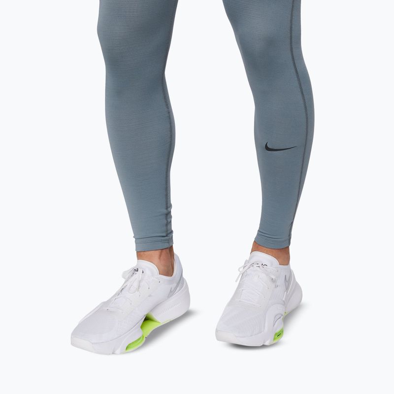 Férfi leggingsek Nike Pro Warm smoke grey/black 6