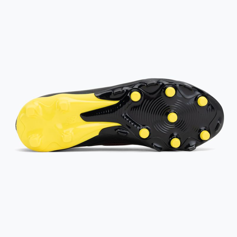 Gyerek focicipő New Balance Tekela Team V5 black 100/punch yellow/fire cracker 4