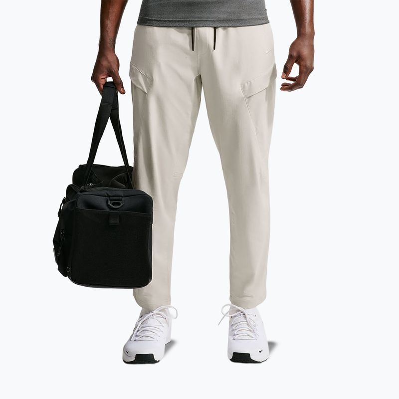 Férfi nadrág Nike Unlimited ight orewood brown/black/light orewood brown 7