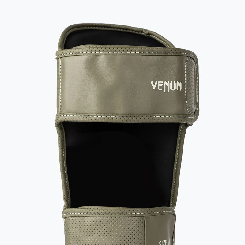 Sípcsont- és lábvédők Venum Impact Evo Scales Shinguards army green 4