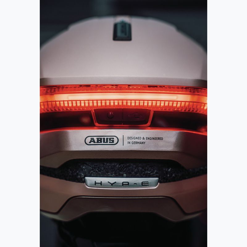 Kerékpáros sisak irányjelzőkkel ABUS Hyp-E champagne gold 9