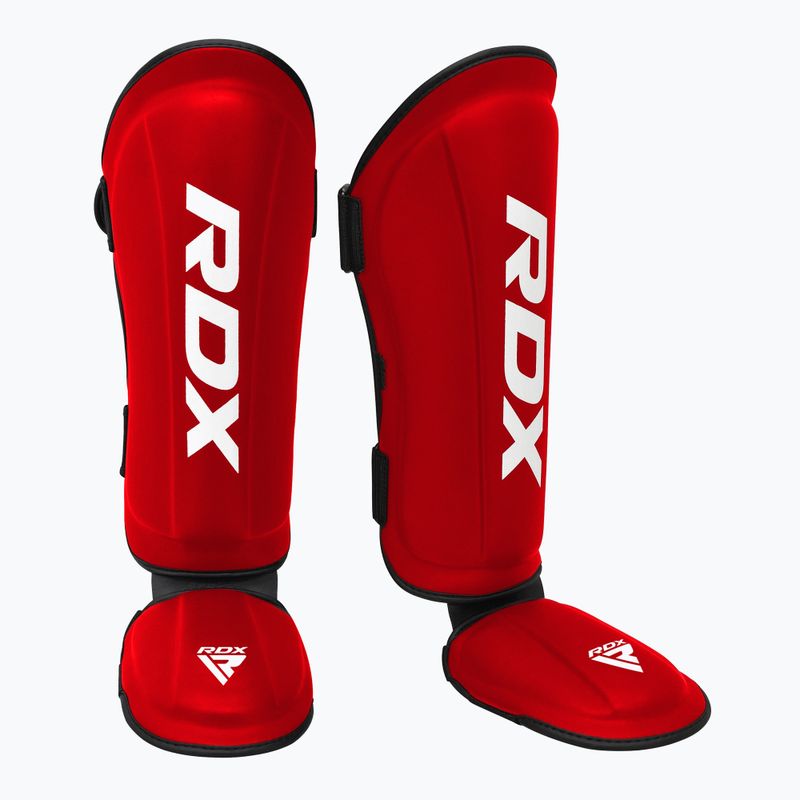 RDX T1 sípcsont- és lábfejvédő piros/fehér RDX T1 Shin Instep Guards sípcsont- és lábfejvédő piros/fehér
