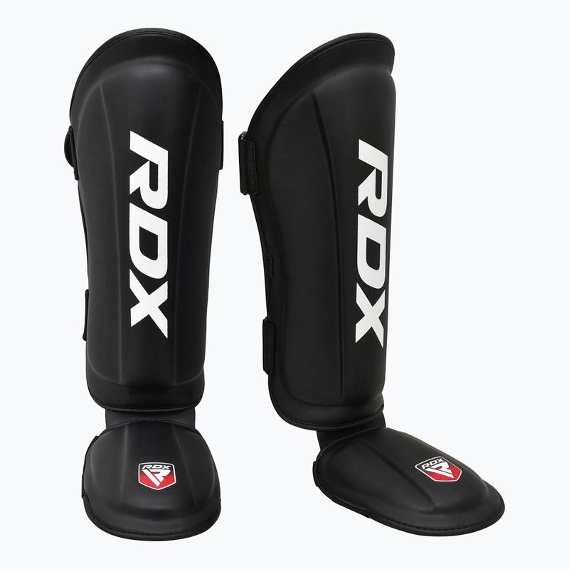 RDX T1 sípcsont- és lábfejvédő fekete RDX T1 Shin Instep Guards sípcsont- és lábfejvédő fekete