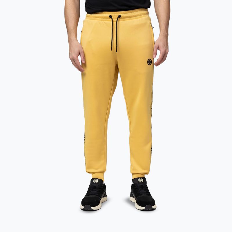 Férfi melegítőnadrág Pitbull Trackpants Tape Logo Terry Group pale yellow