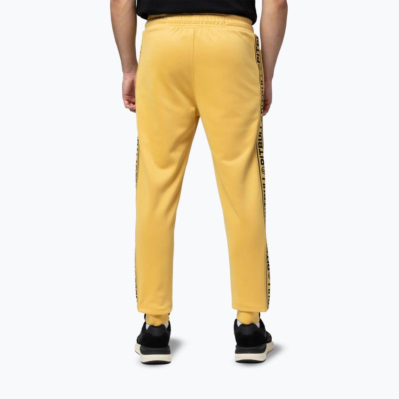 Férfi melegítőnadrág Pitbull Trackpants Tape Logo Terry Group pale yellow 3