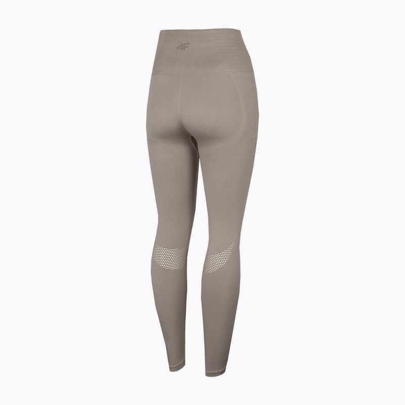 Női varrás nélküli leggings 4F H4Z22-SPDF012 bézs színű 4