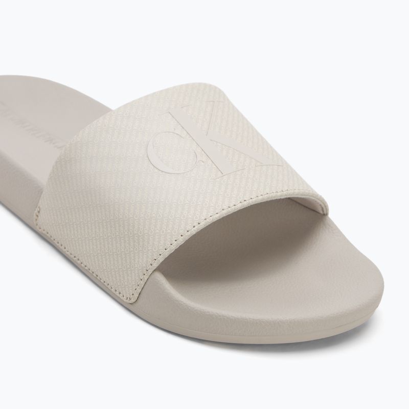 Férfi Calvin Klein YM0YM01269 Slide Aop Print tojáshéj/teknőc galamb flip-flopok 7