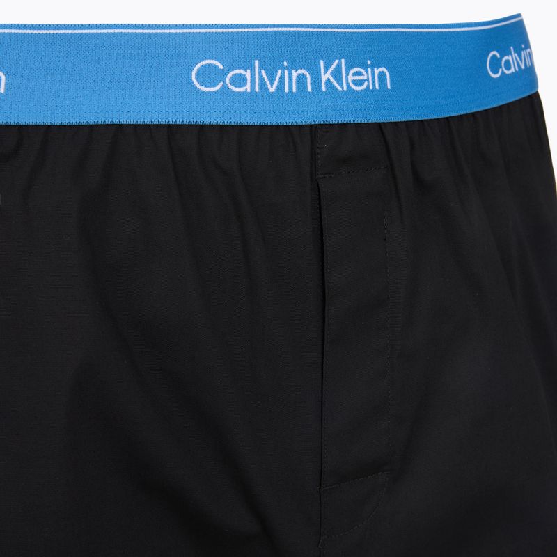 Férfi boxer nadrág Calvin Klein LV00NB4267 Boxer Slim black bodies w/ poseidon blue/plein 6