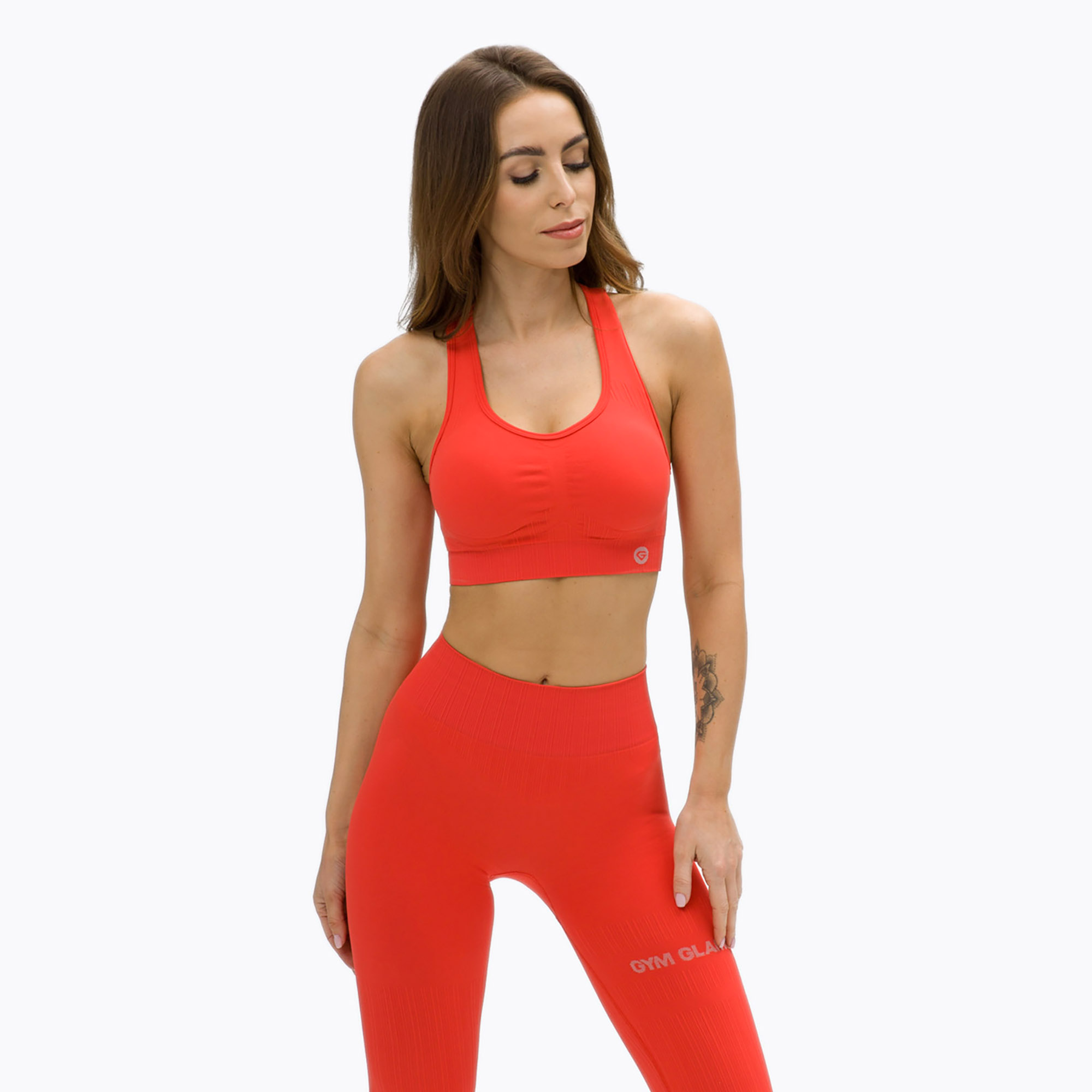 15%-kal olcsóbban.  Női edzőmelltartó Gym Glamour push up korall narancssárga 372. Méret: L