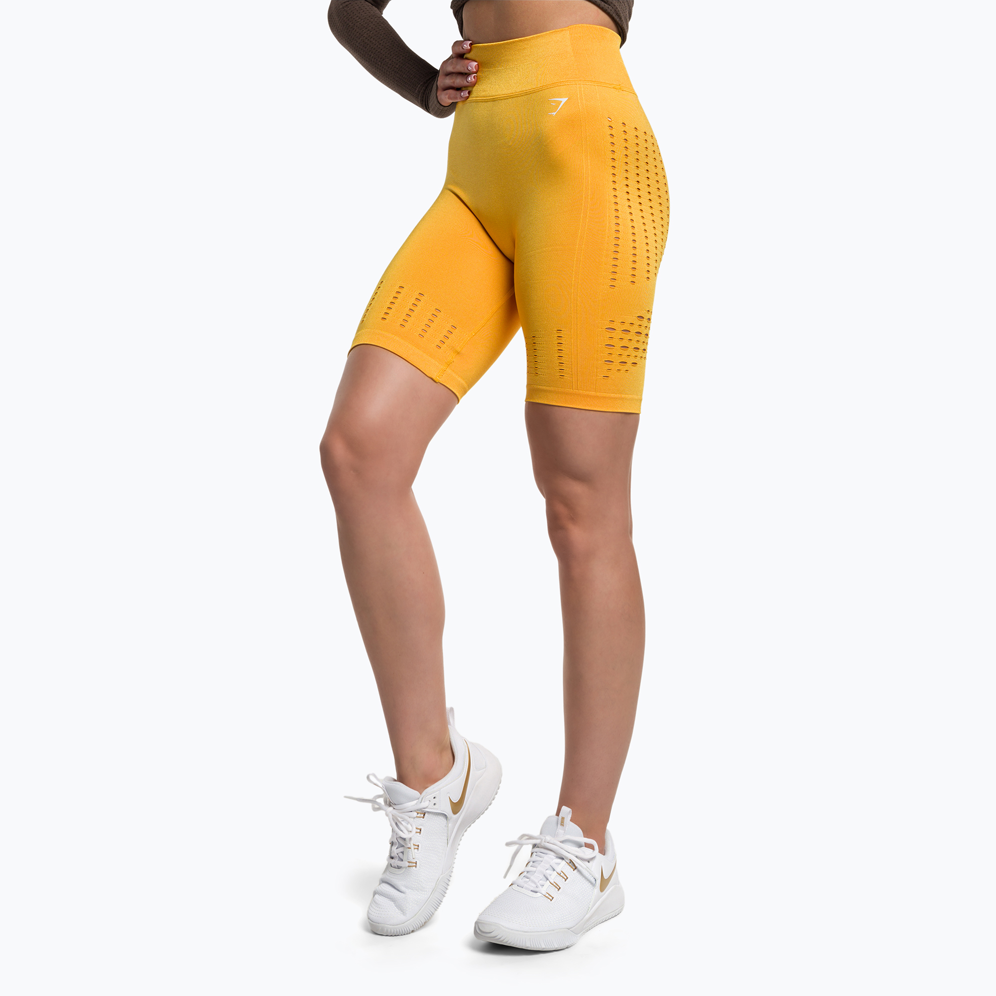 37%-kal olcsóbban.  Női Gymshark Flawless Shine Seamless sáfrány/sárga edzőnadrágok. Méret: M