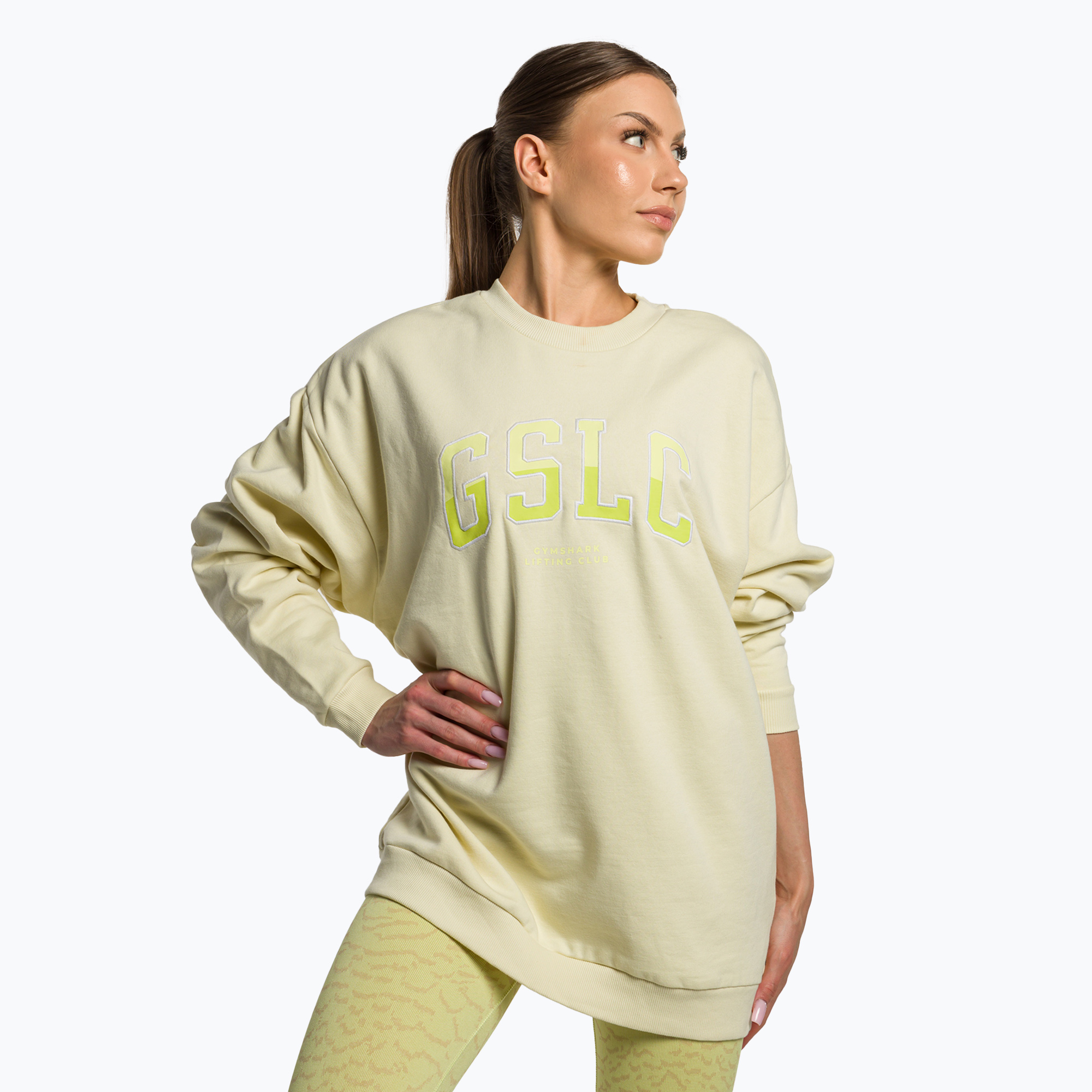 30%-kal olcsóbban.  Női edzős pulcsi Gymshark Gfx Gslc Oversized sárga/fehér. Méret: L