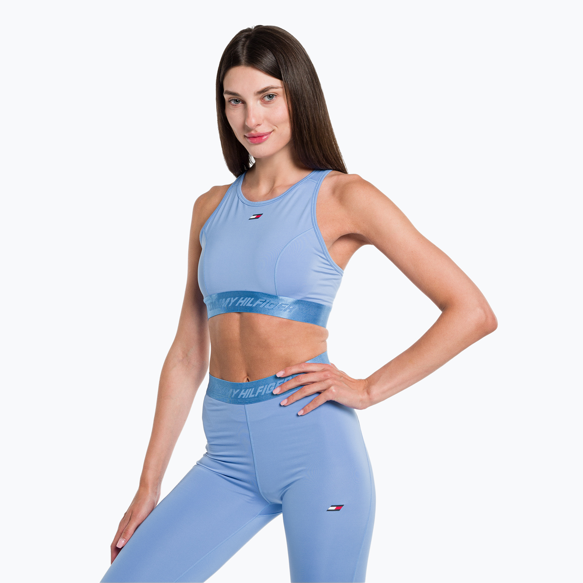 45%-kal olcsóbban.  Tommy Hilfiger Essentials Mid Int Racer Back kék fitness melltartó. Méret: S
